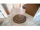 Foyer with custom tile design and view into living area at 10851 E Clovis Ave, Mesa, AZ 85208