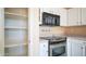 View of kitchen featuring stainless steel appliances and cabinet storage at 10851 E Clovis Ave, Mesa, AZ 85208