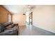 Inviting living room featuring tile flooring, a ceiling fan, and neutral paint, perfect for relaxation at 10851 E Clovis Ave, Mesa, AZ 85208