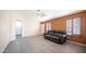 Inviting living room featuring tile flooring, a ceiling fan, and neutral paint, perfect for relaxation at 10851 E Clovis Ave, Mesa, AZ 85208