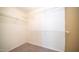 Spacious walk-in closet with metal shelving provides ample storage space at 10851 E Clovis Ave, Mesa, AZ 85208