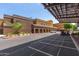 Exterior view of the Fairway Recreation Center with golf cart parking at 10854 N Fairway E Ct, Sun City, AZ 85351