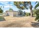 Large backyard with a patio area and barbecue, perfect for outdoor entertaining and relaxation at 10922 W Peoria Ave, Sun City, AZ 85351
