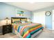 Well-appointed bedroom with ample closet space and a vibrant bedspread at 10922 W Peoria Ave, Sun City, AZ 85351
