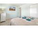 Cozy bedroom featuring soft blue colors and comfortable queen bed at 10922 W Peoria Ave, Sun City, AZ 85351
