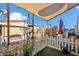 Backyard featuring cozy lounge area with a small, white picket fence at 11596 W Sierra Dawn Blvd # 278, Surprise, AZ 85378