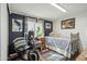 Cozy bedroom featuring shiplap walls, updated floors, and natural light at 11596 W Sierra Dawn Blvd # 278, Surprise, AZ 85378