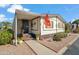 Attractive home with a welcoming entrance, charming landscaping, and an inviting facade at 11596 W Sierra Dawn Blvd # 278, Surprise, AZ 85378