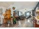 Spacious living room with hardwood floors, custom wood trim, and comfortable seating at 11596 W Sierra Dawn Blvd # 278, Surprise, AZ 85378