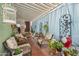 Enclosed patio featuring comfortable seating, tile flooring and green plants at 11596 W Sierra Dawn Blvd # 278, Surprise, AZ 85378