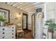Cozy enclosed patio area with a chair, cabinets and charming decor at 11596 W Sierra Dawn Blvd # 278, Surprise, AZ 85378