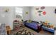 bedroom with racecar theme and natural light at 12344 E Soloman Rd, Gold Canyon, AZ 85118