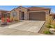 Charming single-story home featuring a tiled roof and a well-maintained desert landscape at 12344 E Soloman Rd, Gold Canyon, AZ 85118