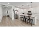 Spacious kitchen with granite island, stainless appliances, and bar seating at 12344 E Soloman Rd, Gold Canyon, AZ 85118