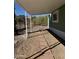 A covered patio and a walkway with a view of a desert landscaped yard at 12814 N 19Th Pl # 19, Phoenix, AZ 85022
