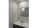 Bathroom featuring a modern vanity with a sleek mirror at 12814 N 19Th Pl # 19, Phoenix, AZ 85022