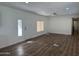 Bright and airy living room offering ample space and new wood-look floors at 12814 N 19Th Pl # 19, Phoenix, AZ 85022