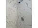 Shower with white marble-look tile, shower head, and chrome fixtures at 12814 N 19Th Pl # 19, Phoenix, AZ 85022