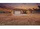 Inviting home featuring a neutral stucco exterior, tile roof, and simple landscaping at 12942 S 218Th Ave, Buckeye, AZ 85326