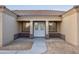 Close up of the front entrance of the home, showing the double front doors at 12942 S 218Th Ave, Buckeye, AZ 85326
