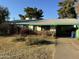 Charming single-story home with a covered carport and mature trees in a quiet neighborhood at 1368 W 14Th St, Tempe, AZ 85281