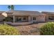 Backyard featuring a covered patio, low-maintenance desert landscaping, and a peaceful outdoor setting at 14218 W Via Tercero --, Sun City West, AZ 85375