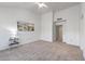An empty bedroom offers generous space and natural light at 14218 W Via Tercero --, Sun City West, AZ 85375