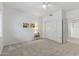 A bedroom offers generous space and access to an ensuite at 14218 W Via Tercero --, Sun City West, AZ 85375