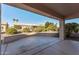 Covered patio area offering ample space and a view of the well-maintained backyard landscaping at 14218 W Via Tercero --, Sun City West, AZ 85375