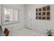 Entryway with tile floors, bright natural light, and access to the garage at 14218 W Via Tercero --, Sun City West, AZ 85375