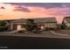 Charming front exterior featuring desert landscaping, garage, and tiled roof at 14218 W Via Tercero --, Sun City West, AZ 85375
