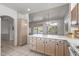Spacious kitchen with tile flooring, white countertops, a large kitchen island, and a pantry for extra storage at 14218 W Via Tercero --, Sun City West, AZ 85375