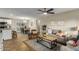 Open-concept living room and dining area with lots of natural light and stylish furniture at 14436 N 34Th Pl, Phoenix, AZ 85032