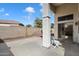 A view of a covered patio area, providing a shady retreat and featuring tiled flooring at 14610 N 87Th Ave, Peoria, AZ 85381