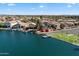 Beautiful aerial image capturing the waterfront homes with boat docks along the lakefront at 14610 N 87Th Ave, Peoria, AZ 85381