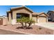 Charming single story home with a two car garage and well maintained desert landscaping at 14846 N 145Th Ave, Surprise, AZ 85379