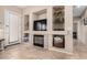 Cozy living room with built-in shelves, a fireplace, and neutral decor at 14846 N 145Th Ave, Surprise, AZ 85379
