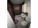 View of bathroom featuring built-in tub and pedestal sink at 150 N 65Th St, Mesa, AZ 85205