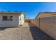 Low maintenance backyard with gravel and a newer fence at 15028 N 35Th Ave, Phoenix, AZ 85053