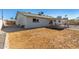 Expansive backyard with some covered patio space and a view of the exterior of the home at 15028 N 35Th Ave, Phoenix, AZ 85053
