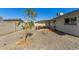 Low maintenance backyard with gravel and a covered patio area at 15028 N 35Th Ave, Phoenix, AZ 85053