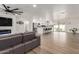 Open floor plan with a seamless transition from living area to kitchen with a breakfast bar at 15028 N 35Th Ave, Phoenix, AZ 85053