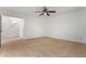 Bright bedroom with neutral carpet and large doorway, offering a sense of openness at 16189 N 137Th Dr, Surprise, AZ 85374