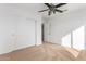 Bedroom with double-door closet and neutral carpet providing a spacious atmosphere at 16189 N 137Th Dr, Surprise, AZ 85374