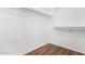 Empty walk-in closet with laminate floors and rod iron for ample storage at 16189 N 137Th Dr, Surprise, AZ 85374