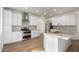 Modern kitchen with stainless steel appliances, granite counters, and a stylish tile backsplash at 16189 N 137Th Dr, Surprise, AZ 85374