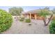 Beautifully landscaped backyard with patio, plants, and privacy at 16372 W Mulberry Dr, Goodyear, AZ 85395