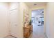 Welcoming entryway featuring tiled floors, a console table, and ample lighting at 16372 W Mulberry Dr, Goodyear, AZ 85395