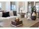Well-decorated living room featuring modern accents, stylish decor, and comfortable seating at 16372 W Mulberry Dr, Goodyear, AZ 85395