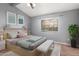 Inviting bedroom with natural light, stylish decor, and a cozy ambiance at 1718 S Longmore -- # 41, Mesa, AZ 85202